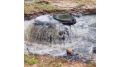 В Твери сотрудники "Водоканала" устраняют прорыв канализации на Соминке